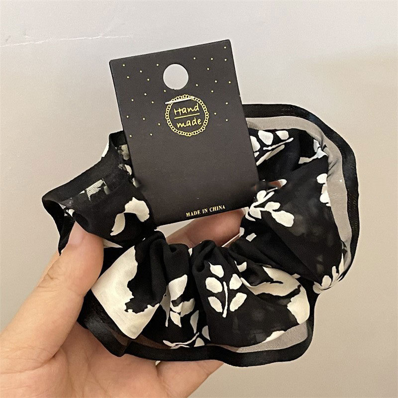 A new retro and high-end hair tie for women with a French elegant flower ribbon bow and large colon hair band. It is a gentle headwear pic 4