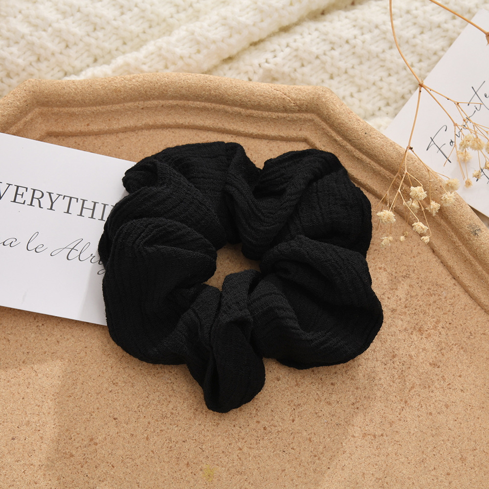 The new autumn and winter knitted cotton and linen solid-color large intestine hair band is versatile for tying ponytails, hair bands, hair accessories, bun hairstyles and hair ties pic 2