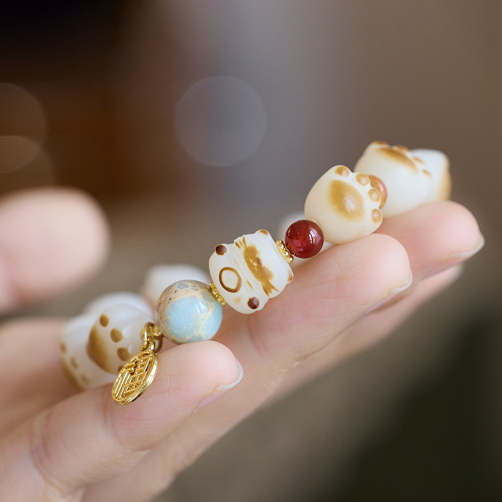 Natural charcoal-grilled cat paw Bodhi root bracelet, female cat milk bean pendant, Bodhi root little cat Buddhist prayer beads bracelet wholesale pic 9