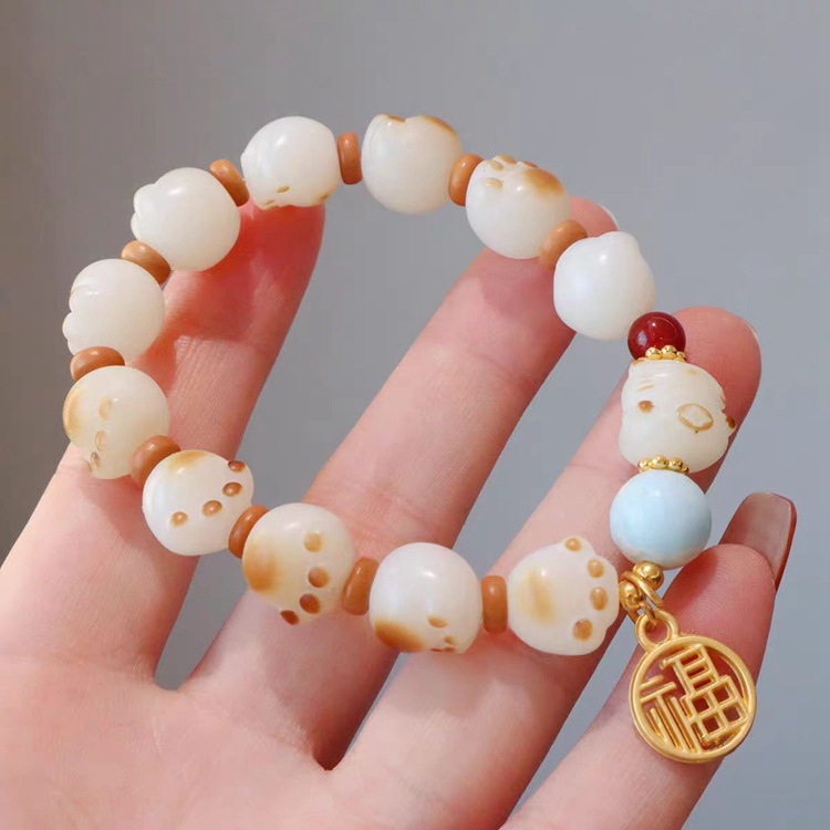 Charcoal-burned cat paw cat bracelet, female imitation white jade Bodhi seed, playful, soft Bodhi hand-held bracelet, live-streaming accessory pic 14