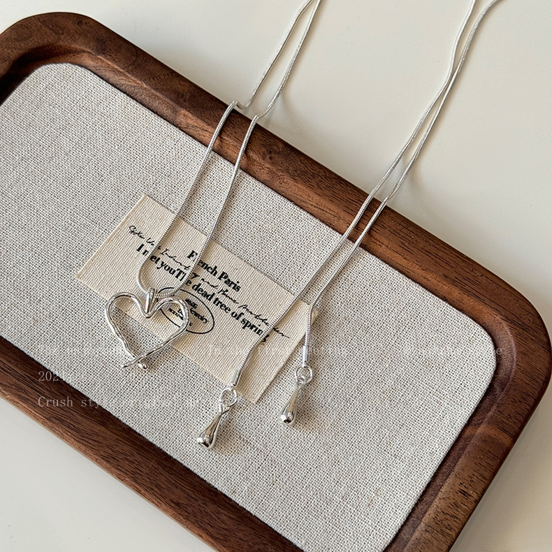 Cold and simple pull-out silver titanium steel snake bone necklace for women, 2025 new style, light luxury and high-end long sweater chain pic 3