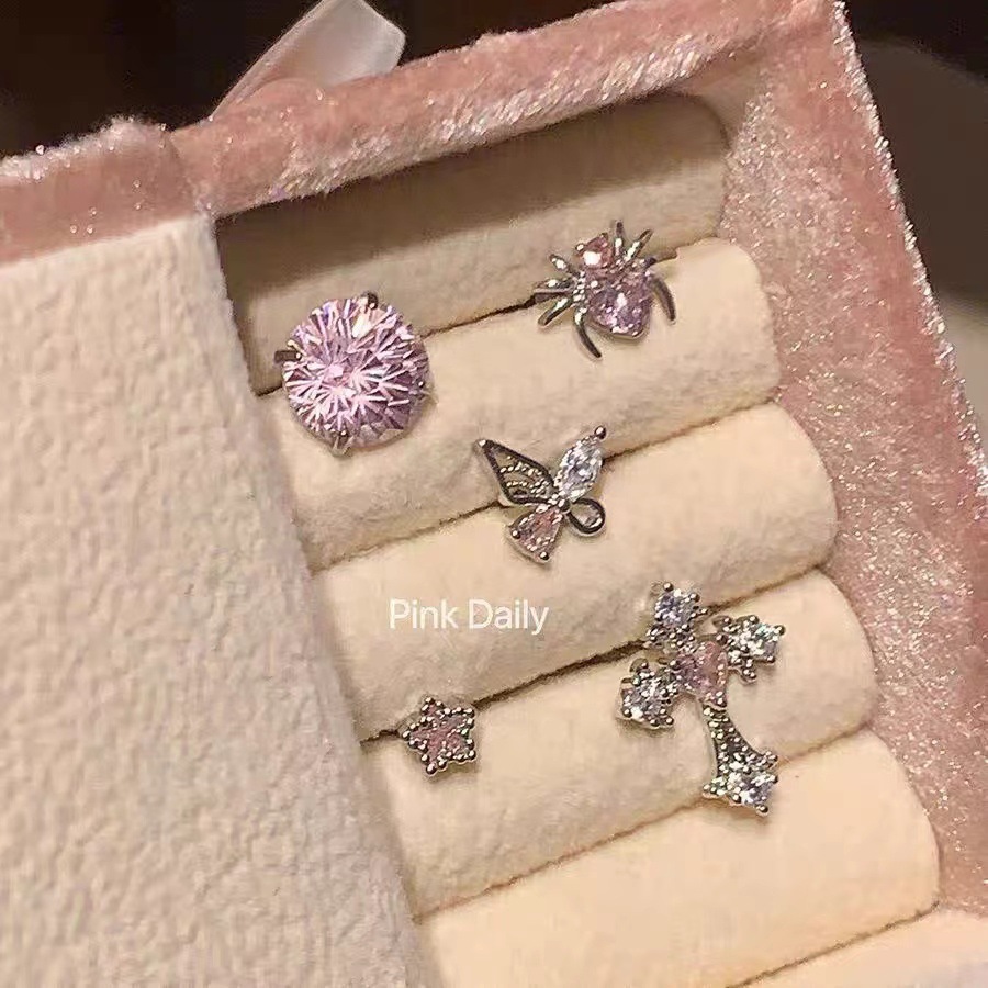 The new pink zircon cross ear bone stud titanium steel screw firework cut cochlear stud butterfly earrings are very stylish pic 1