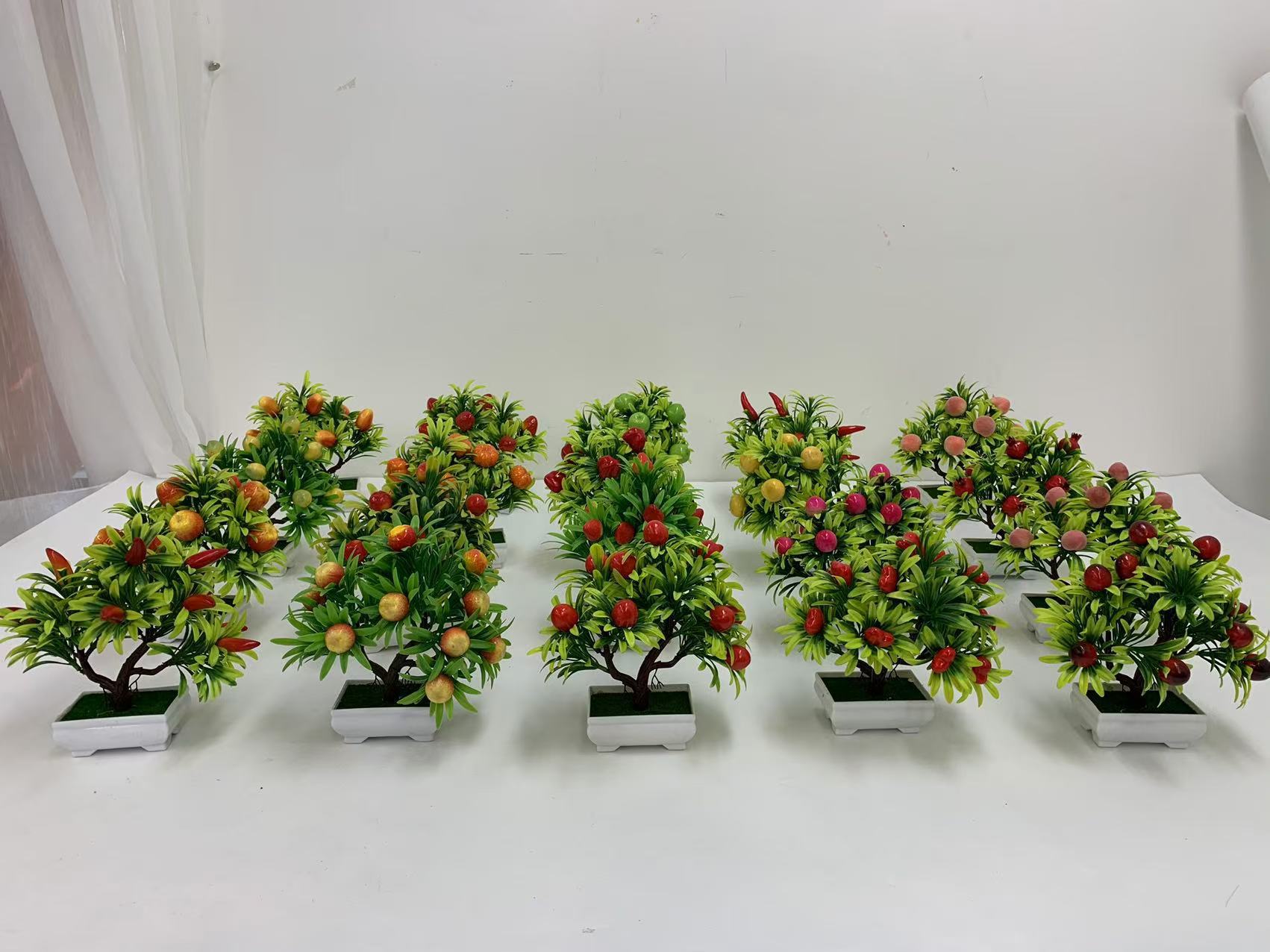 A comprehensive collection of simulated fruit potted plants and bonsai, including red apples, pomegranates, strawberries, oranges, peaches, mangoes, bananas, and red peppers for decoration pic 25