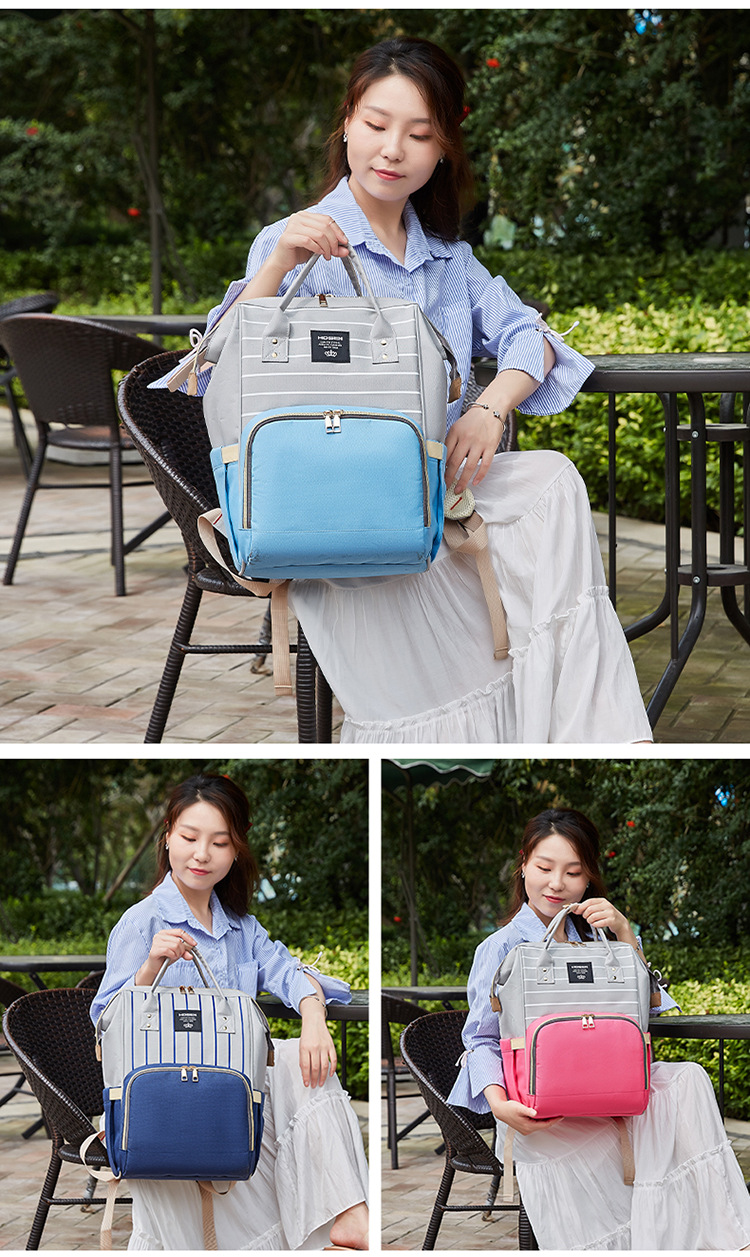 The 2021 new simple and fashionable striped mother and baby backpack can be hung on a stroller, a multi-functional mom bag, and a large-capacity maternity bag pic 20