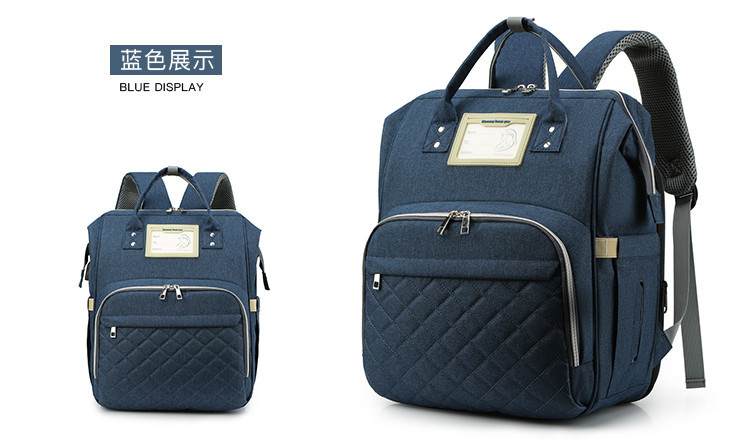 Nuevo modelo mommy bag cama cama plegable baby bag mamá multifuncional recargable impermeable bordado hilo mochila cama cross-border blast pic 29