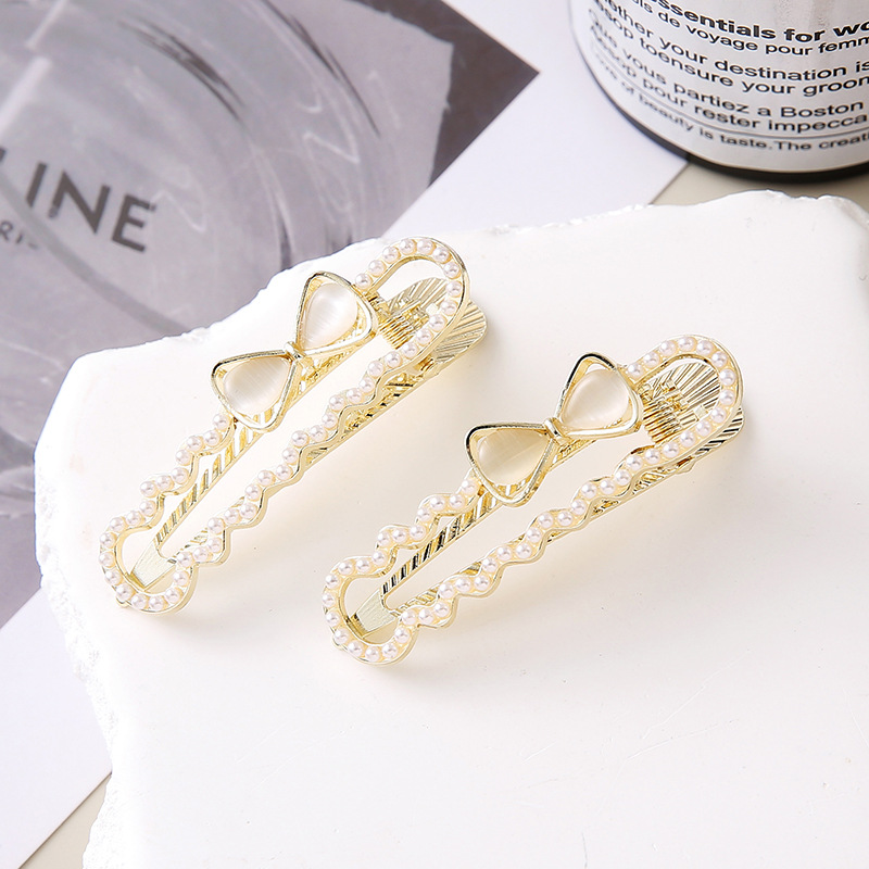 韩版小众设计珍珠蝴蝶结鸭嘴夹发夹2025新款高端气质刘海一字发卡详情1