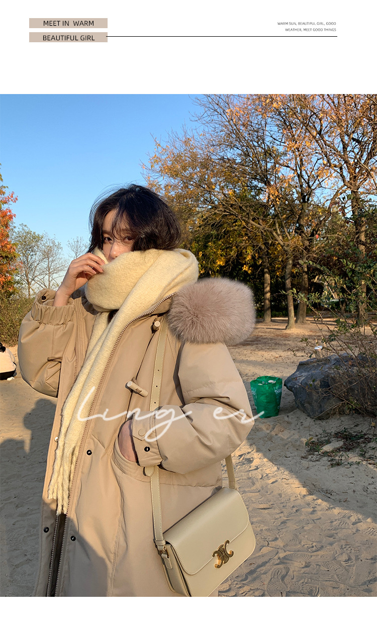 Wholesale of high-end mid-length down jackets for women that reach the knees in 2022, featuring a fashionable design sense and a niche thickened coat pic 44