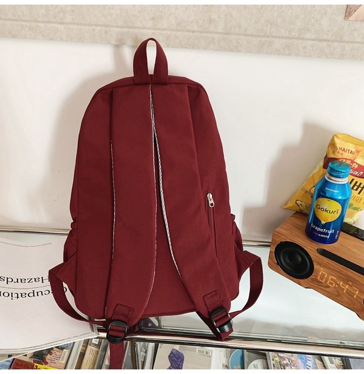 贝尔书包女生大学生简约黑色大容量初中生高中2024新款背包双肩包详情17