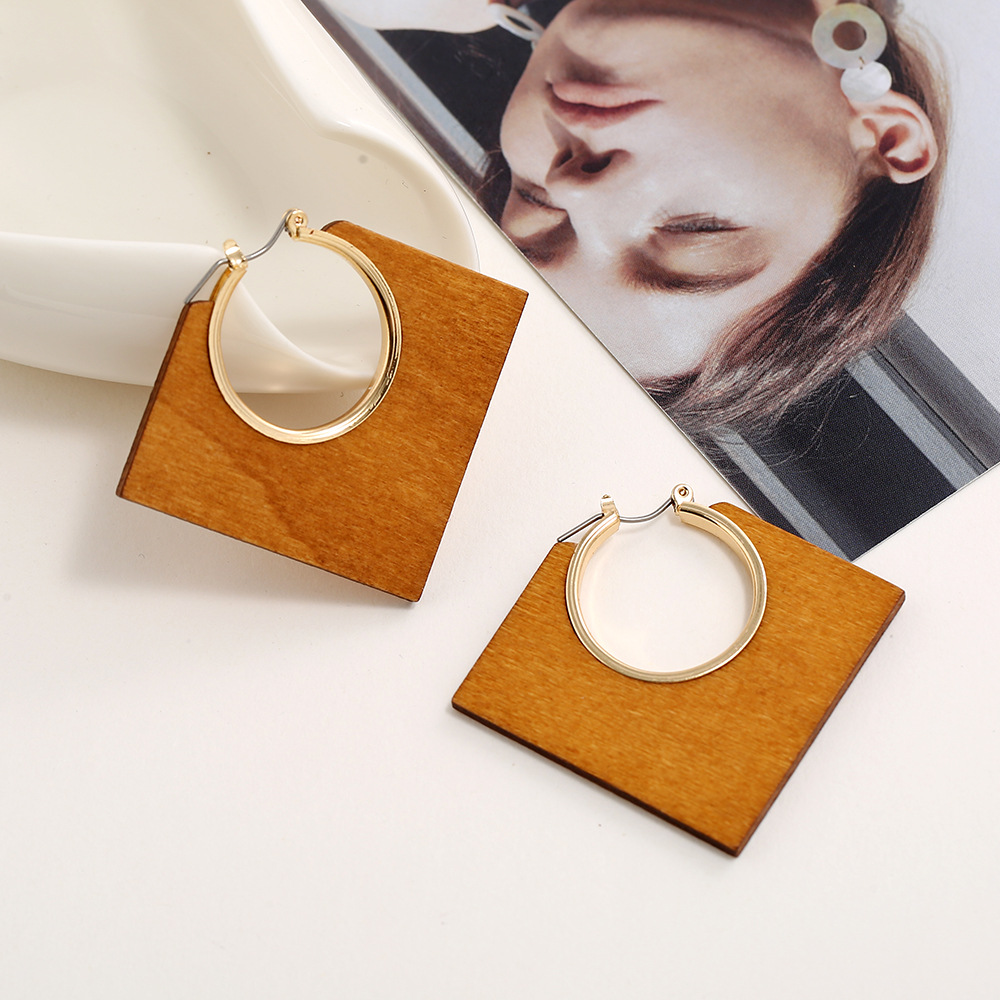 Cross-border exclusive European and American new ear rings, creative geometric classic solid color solid wood diamond-shaped hollowed-out alloy earrings and earrings pic 16