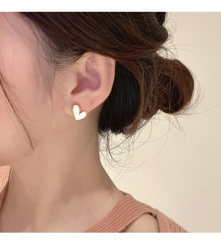 925银针独特爱心日常耳钉女轻奢耳环小众设计感耳饰蚊香盘耳夹详情9