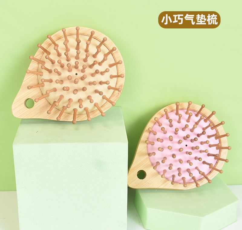 猪鬃毛气垫梳美发梳蓬松造型按摩气垫梳子头皮经络梳美竹木气囊梳详情4