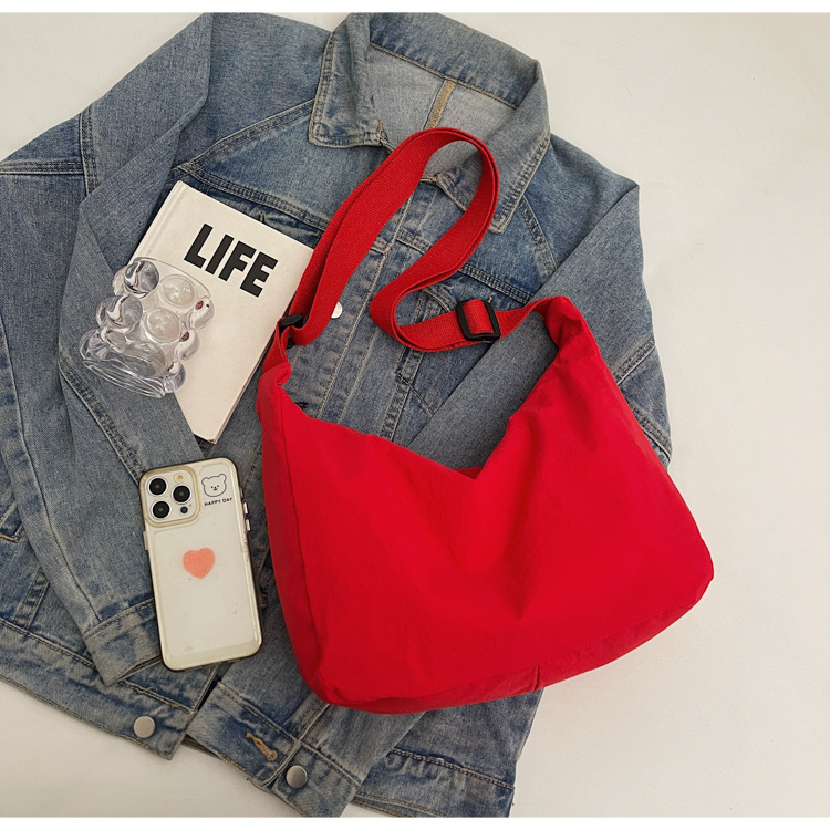 防水尼龙布袋斜挎包2024新款百搭饺子包简约百搭大容量上课单肩包详情22