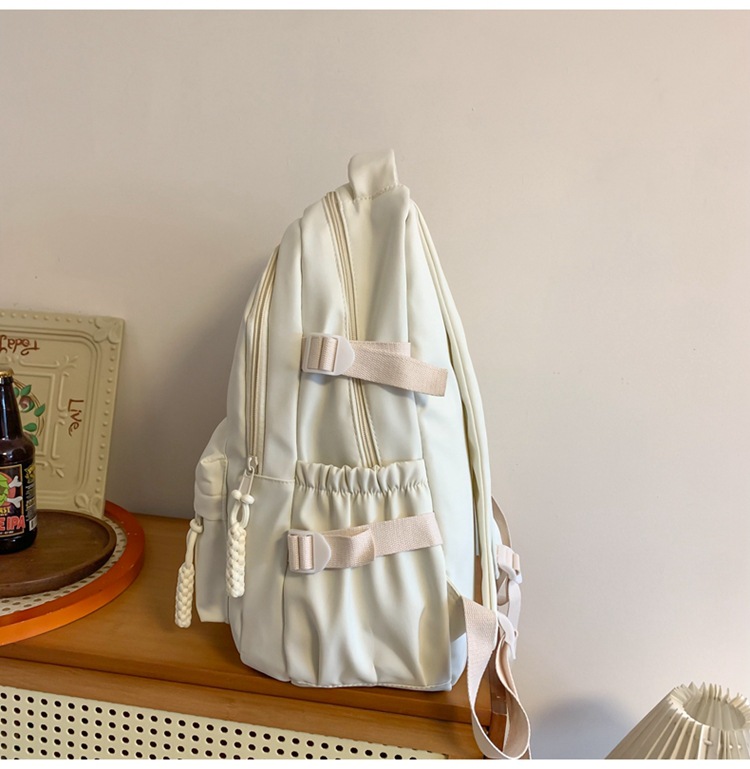 书包大容量高颜值初高中生新款双肩包大容量纯色简约防泼水背包详情40