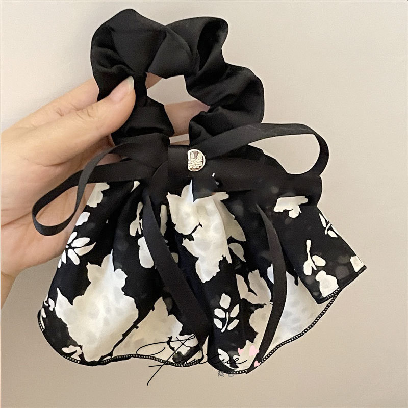 A new retro and high-end hair tie for women with a French elegant flower ribbon bow and large colon hair band. It is a gentle headwear pic 2