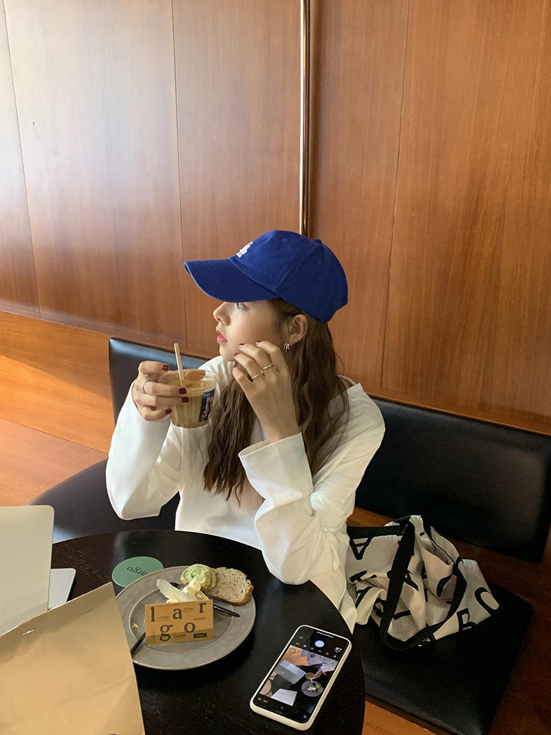 黄峥简约贴标开叉长袖T恤女2022春韩版宽松休闲设计感上衣T85396详情15