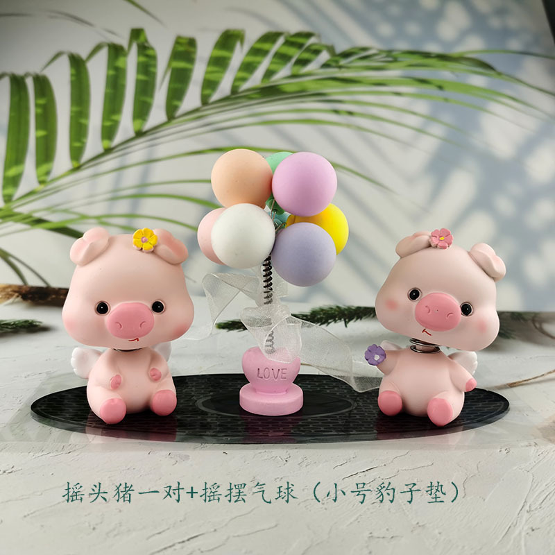 一件代发汽车香水摆件防滑垫树脂摇头公仔萌萌猪告白气球水晶座详情3