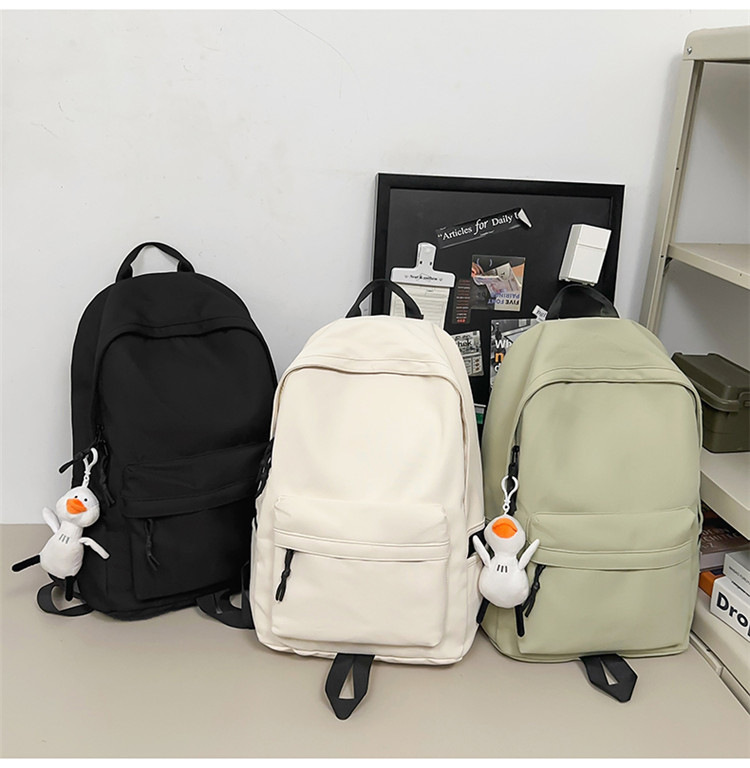 跨境2024新款男简约高中大学生双肩包女休闲大容量初中生旅行背包详情32