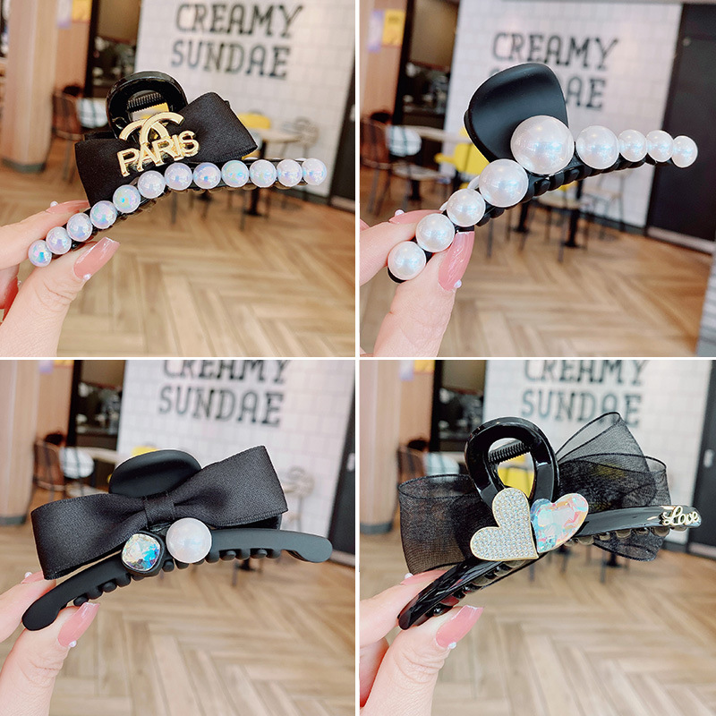 新款小众设计字母中号南瓜抓夹女三角形简约质感鲨鱼夹盘发发抓发详情11