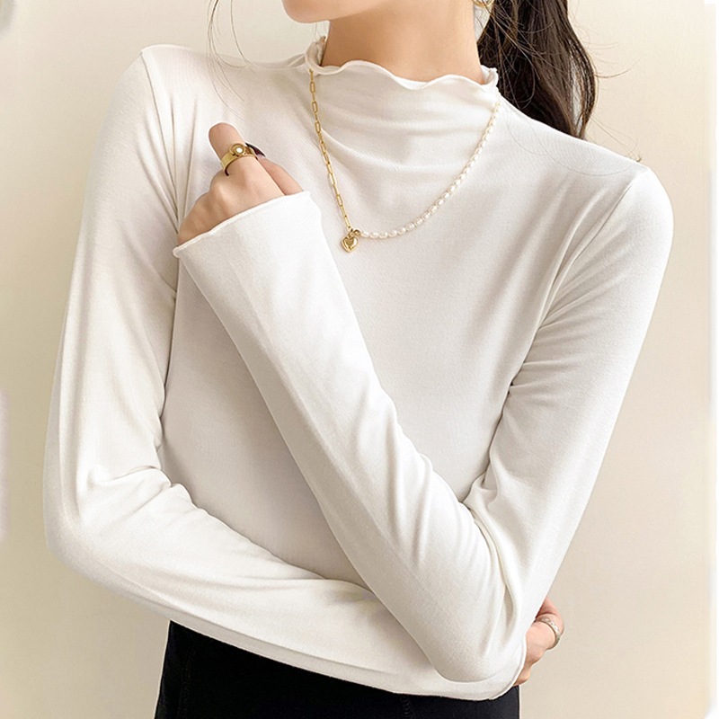 The 2022 autumn and winter new style base shirt for women is a semi-high-neck long-sleeved solid color with black fungus edges, paired with a fitted and warm German velvet top pic 3