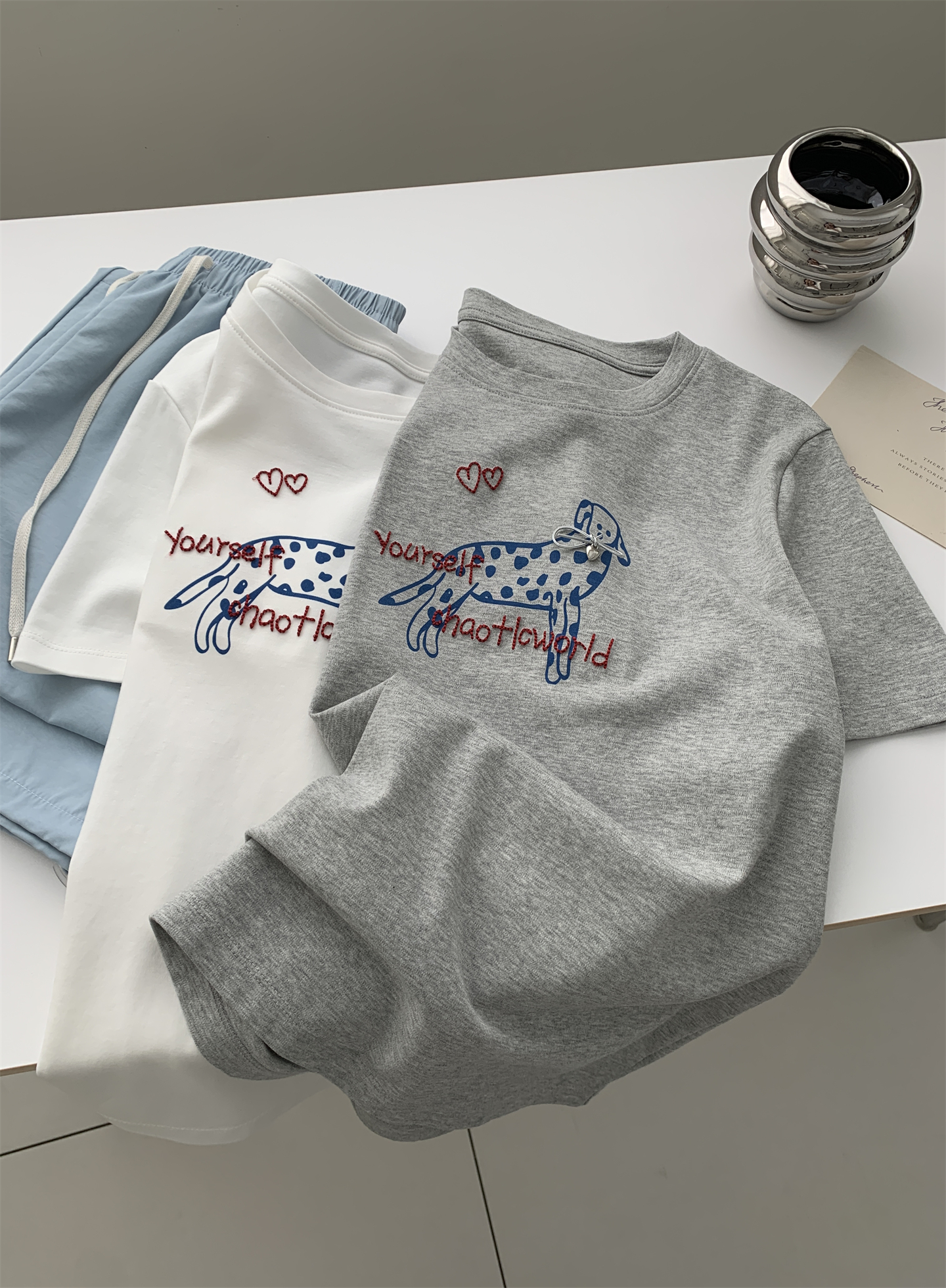 A trendy Korean-style loose and casual short-sleeved T-shirt with a bow and spotted dog print for women in summer, featuring pure cotton embroidery pic 16