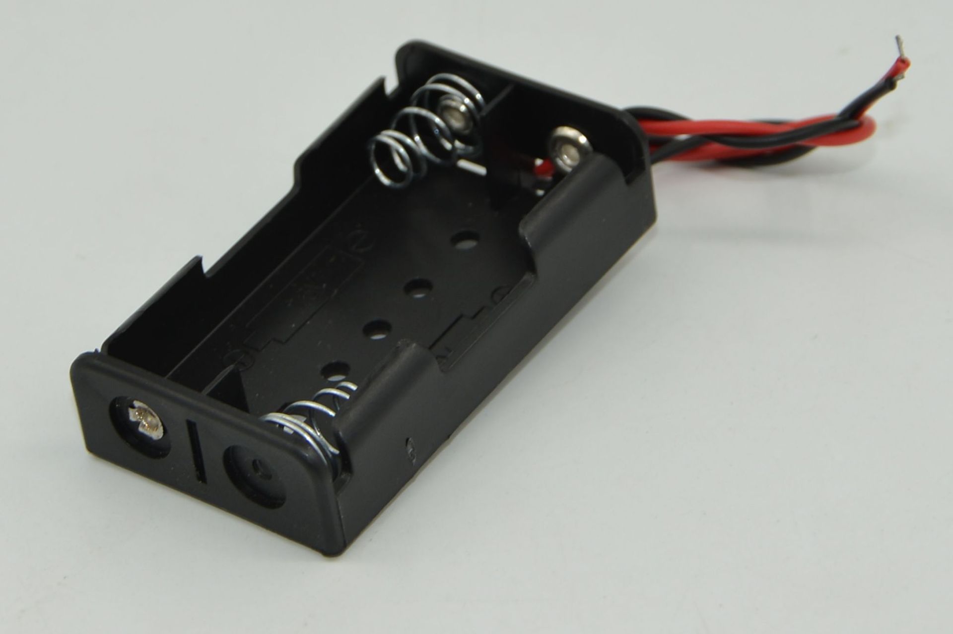 Two AA battery boxes, uncovered with wires, black power supply, positive and negative DC power supply, student experiment science physics pic 6