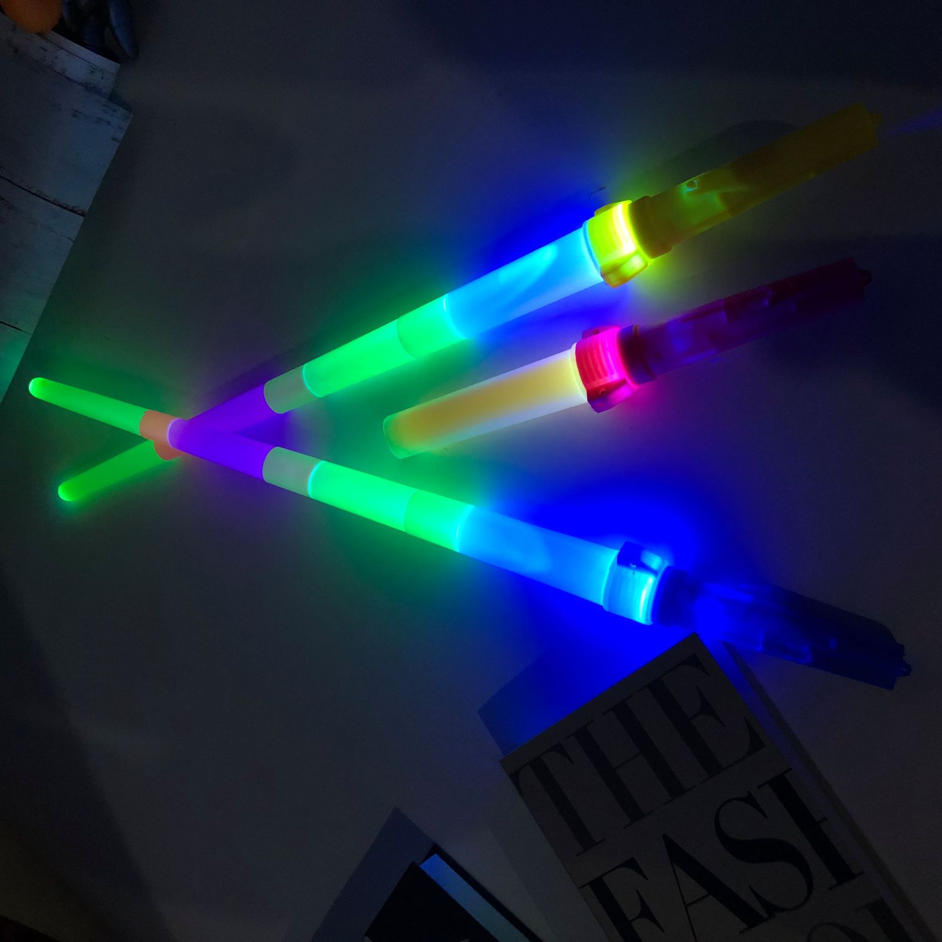 Wholesale of large-sized four-section luminous sticks, contraction sticks, magic sticks, three-position adjustable flash sticks, and extendable fluorescent sticks pic 1