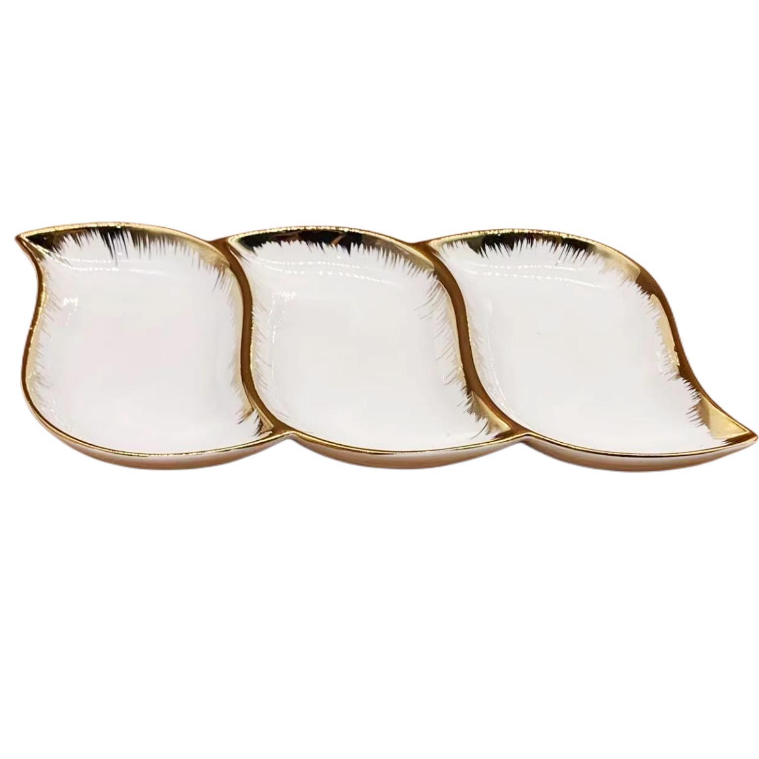 A pure white petal-shaped fruit platter with electroplated gold and multiple compartments, a hand-held restaurant banquet food platter pic 15