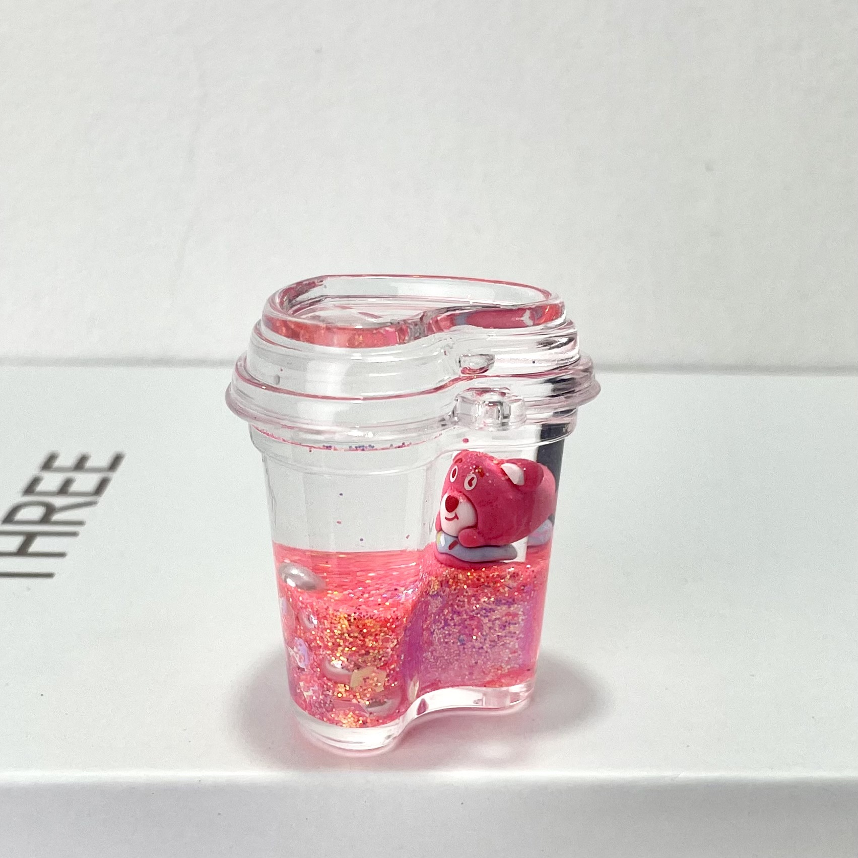 Luminous strawberry bear oil flowing sand bottle liquid pendant, hanging piece, acrylic keychain, key chain accessories wholesale pic 3