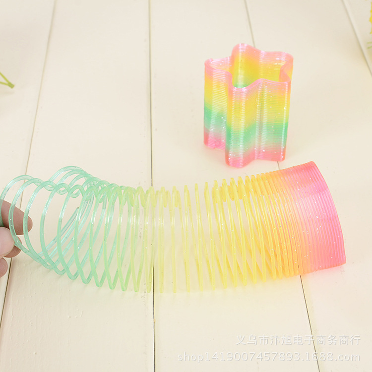 Classic toys come in a myriad of variations. Rainbow ring stacking toys, plastic spring ring toys, 2-yuan store supply pic 9