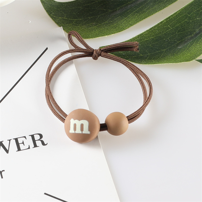 Korean version of the popular ins milk tea-colored M-bean hair band, high-elasticity hair tie rubber band, two-yuan store wholesale hair accessory supply pic 17