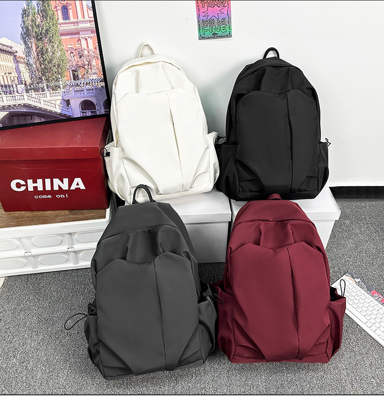 2024新款书包女大学生高中初中生旅行防水背包潮牌男大容量双肩包详情4