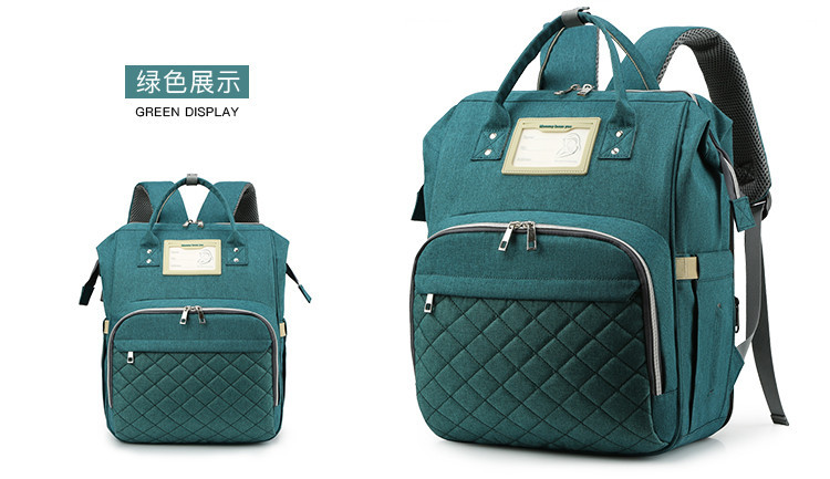 Nuevo modelo mommy bag cama cama plegable baby bag mamá multifuncional recargable impermeable bordado hilo mochila cama cross-border blast pic 30