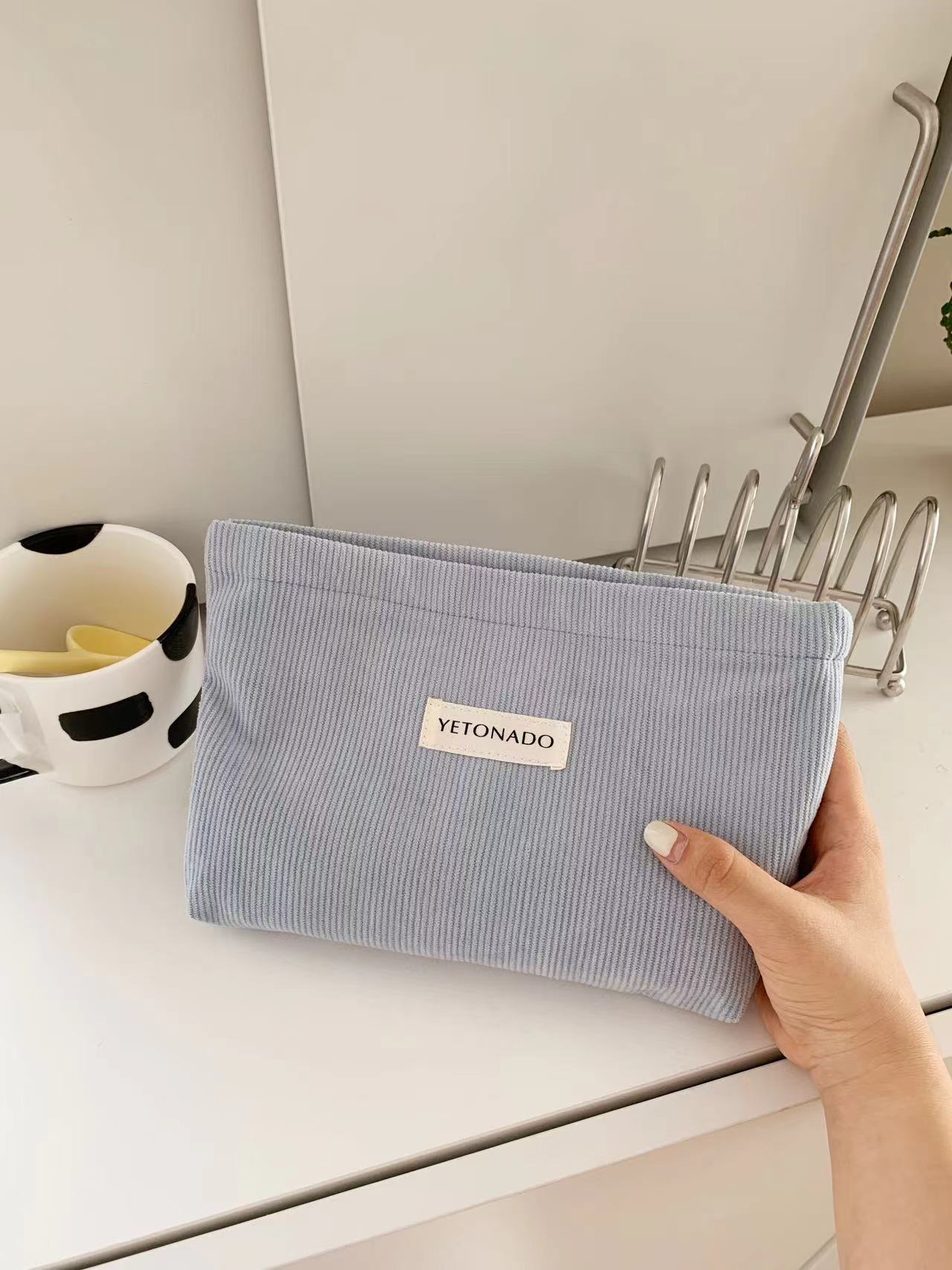 纯色灯芯绒布袋大容量化妆包手拿包收纳帆布袋收纳包便携洗漱包详情15