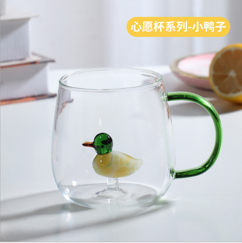 Venta al por mayor nuevo diseño de vidrio de borosilicato alto nivel de apariencia con el mango de la taza de agua para el hogar forma animal taza de vidrio de agua pic 12