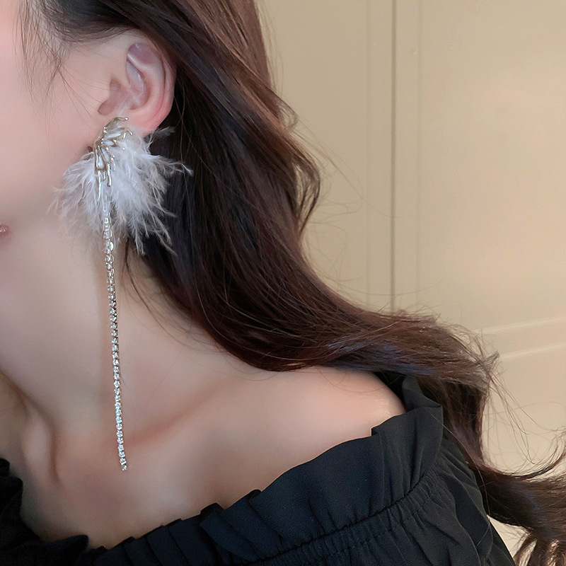 Silver needle asymmetrical feather butterfly diamond-encrusted tassel earrings, niche and unique design sense ear studs, popular long earrings pic 6