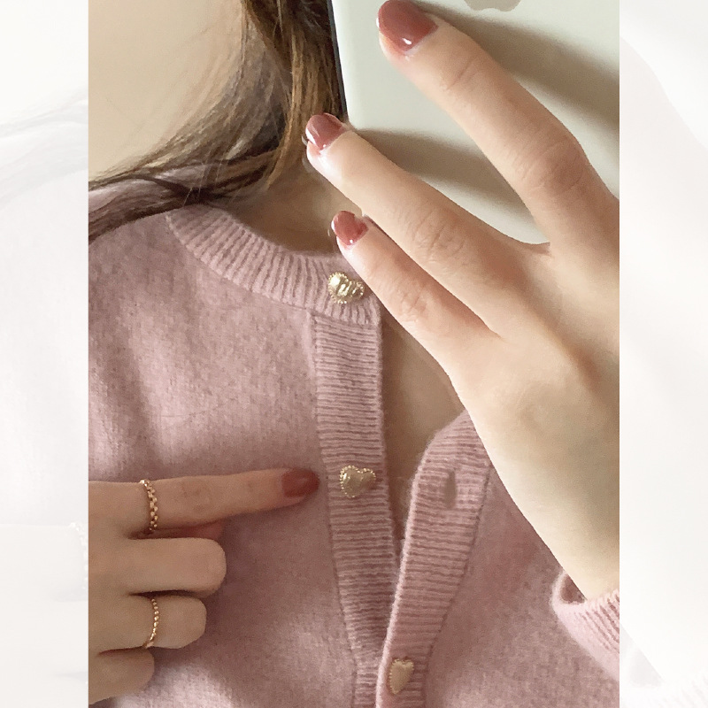 A gentle pink sweater with heart-shaped buttons for women in the spring and autumn of 2022, paired with a loose and sweet knitted cardigan jacket pic 27