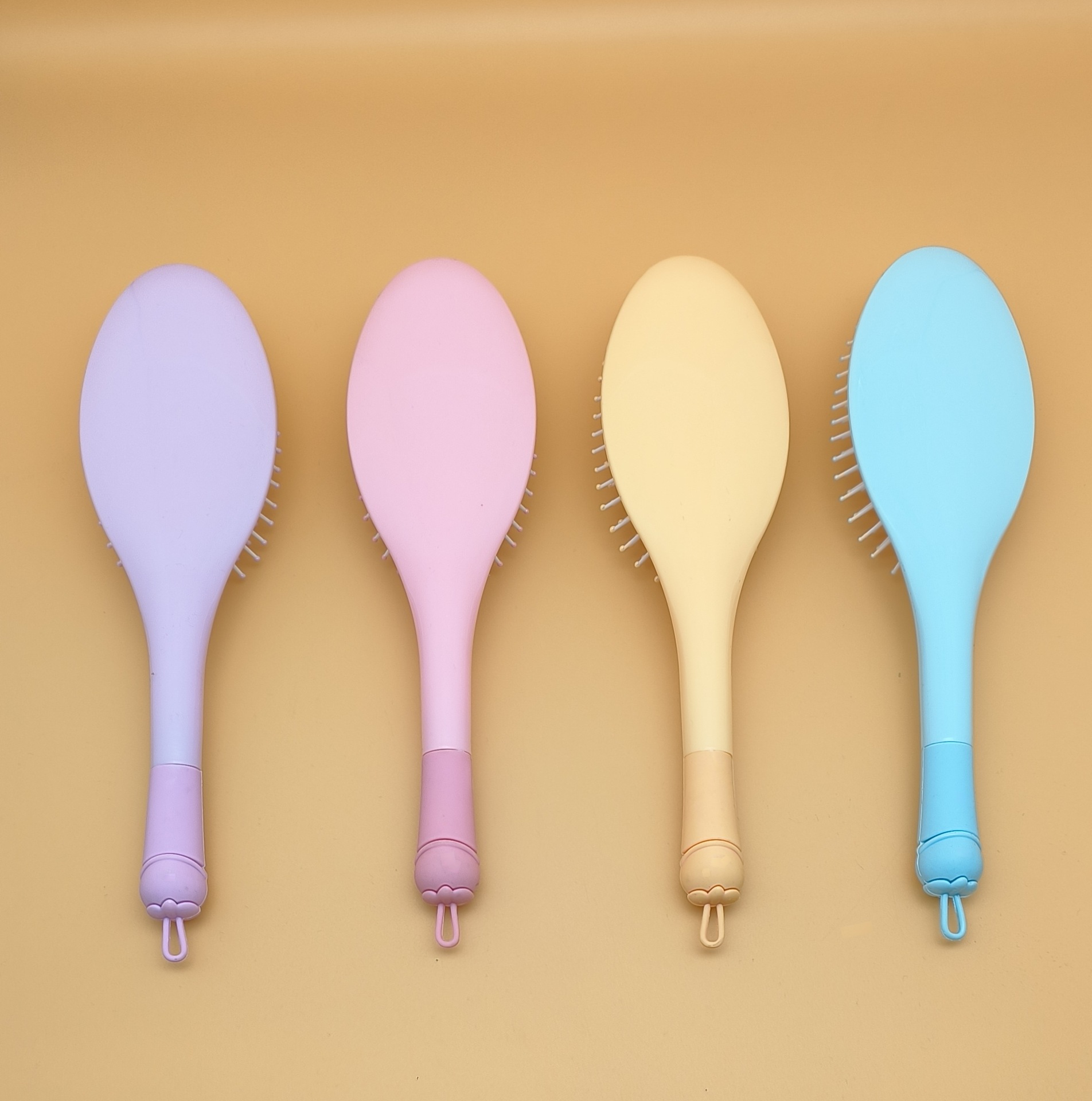 新款女生专用可爱卡通硅胶软头大方头气垫梳 蓬松造型气囊梳圆滚排骨梳 烧烤刷款式梳子详情17