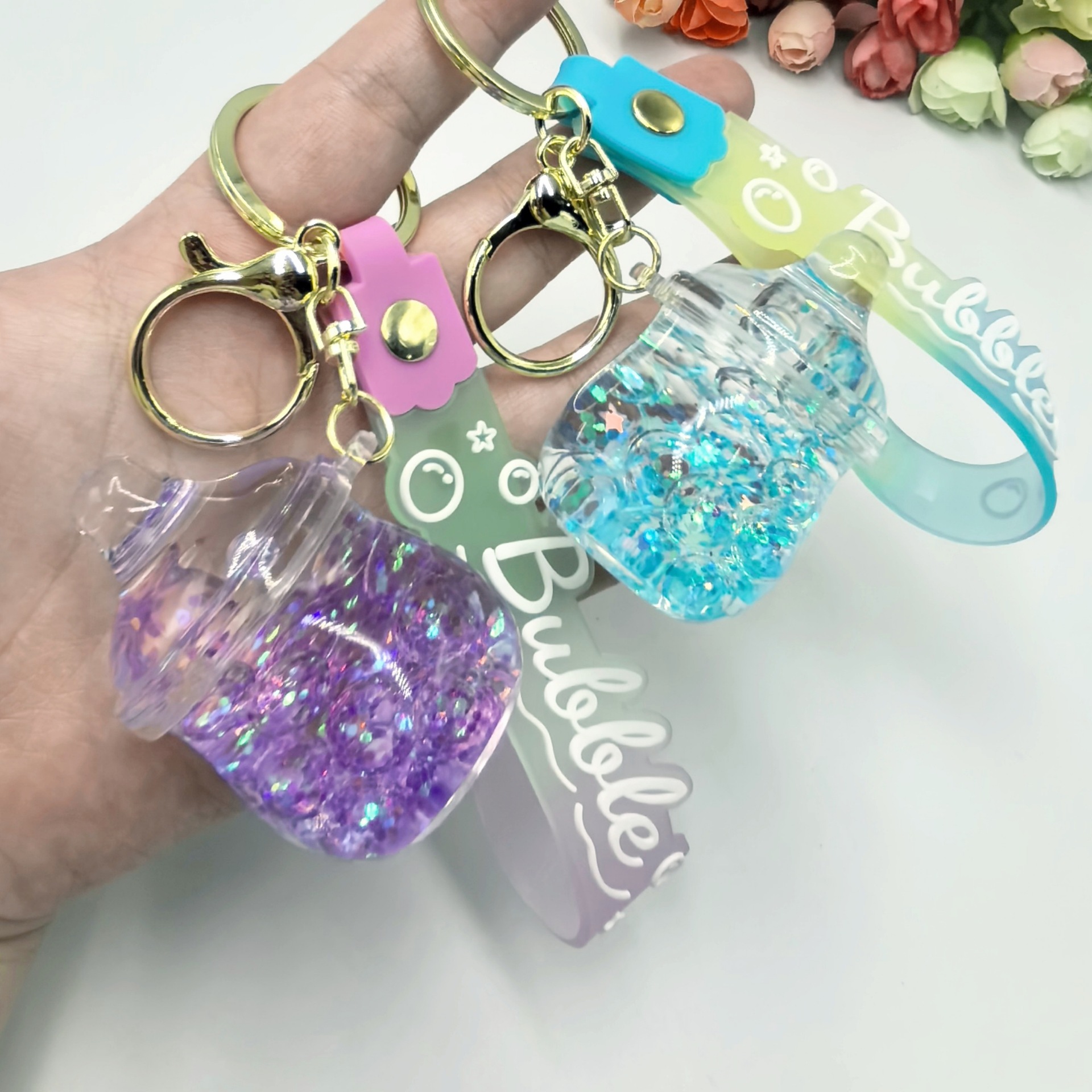 夜光泡泡珠流沙入油奶瓶钥匙扣挂件精品潮流包包挂饰创意礼品详情4