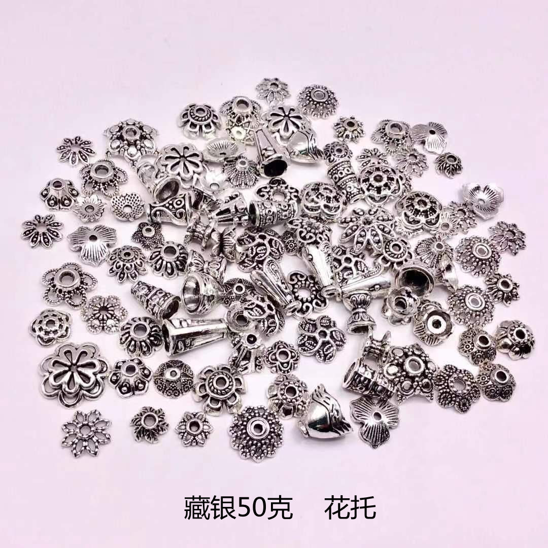 A 50g mixed bag of Tibetan silver bracelets, pendants, alloy jewelry accessories, diy flower trays, spacers, and drum beads pic 2