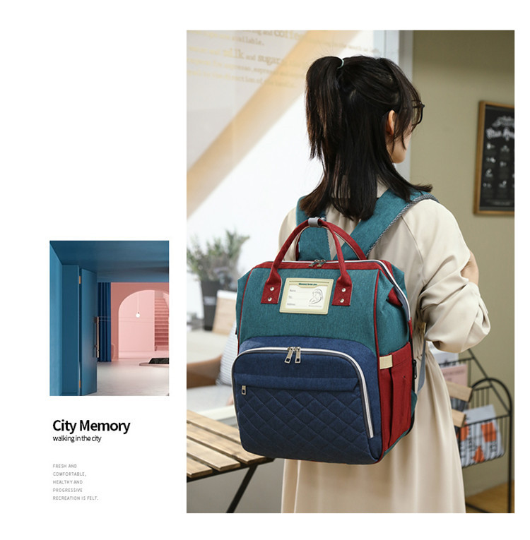 Nuevo modelo mommy bag cama cama plegable baby bag mamá multifuncional recargable impermeable bordado hilo mochila cama cross-border blast pic 21