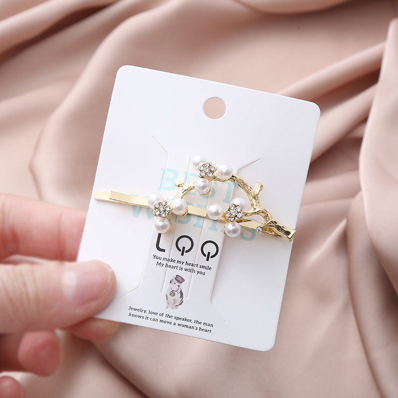 New Korean style forest-themed tree branch pearl rhinestone hair clip for women, simple and fashionable bangs clip, sweet hair accessory factory price wholesale pic 4