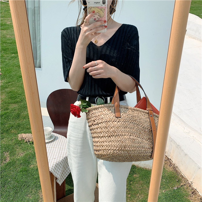 This ice silk short-sleeved V-neck knitted sweater is a summer base T-shirt for women. It can be worn over a thin, loose black chanel-style top pic 11