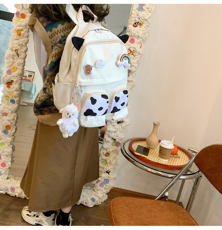 Japanese-style ins campus school style, fresh and cute, cute cow with earbuds, soft girl schoolbag, funny student backpack pic 4