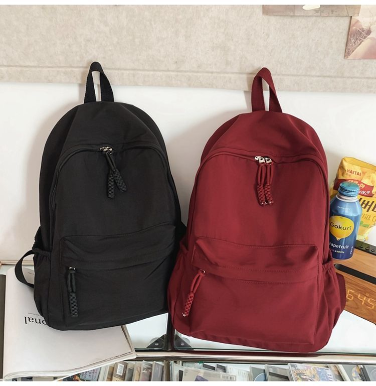 贝尔书包女生大学生简约黑色大容量初中生高中2024新款背包双肩包详情16
