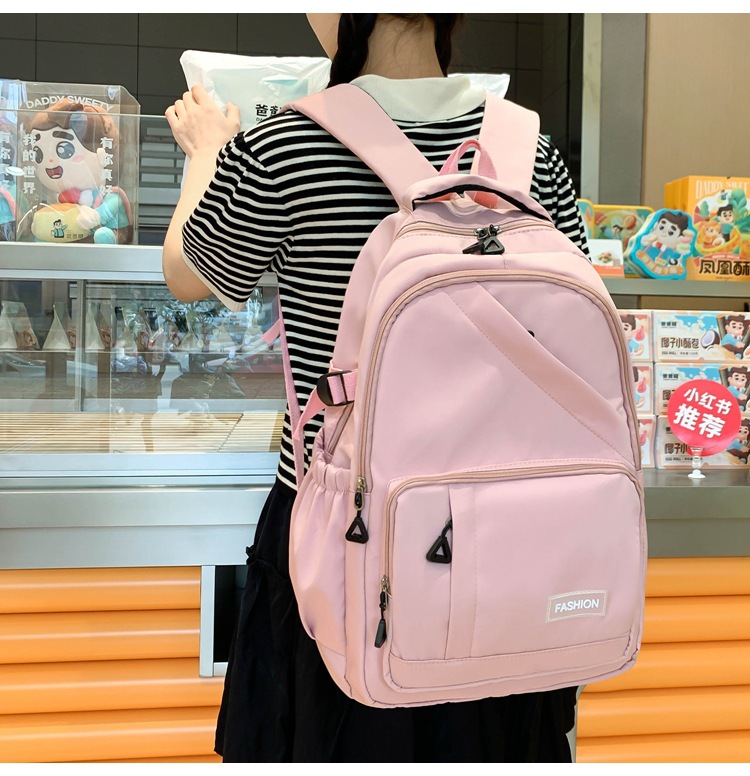 纯色学生书包女批发轻便大容量中大学生双肩包女3-6年级校园背包详情17