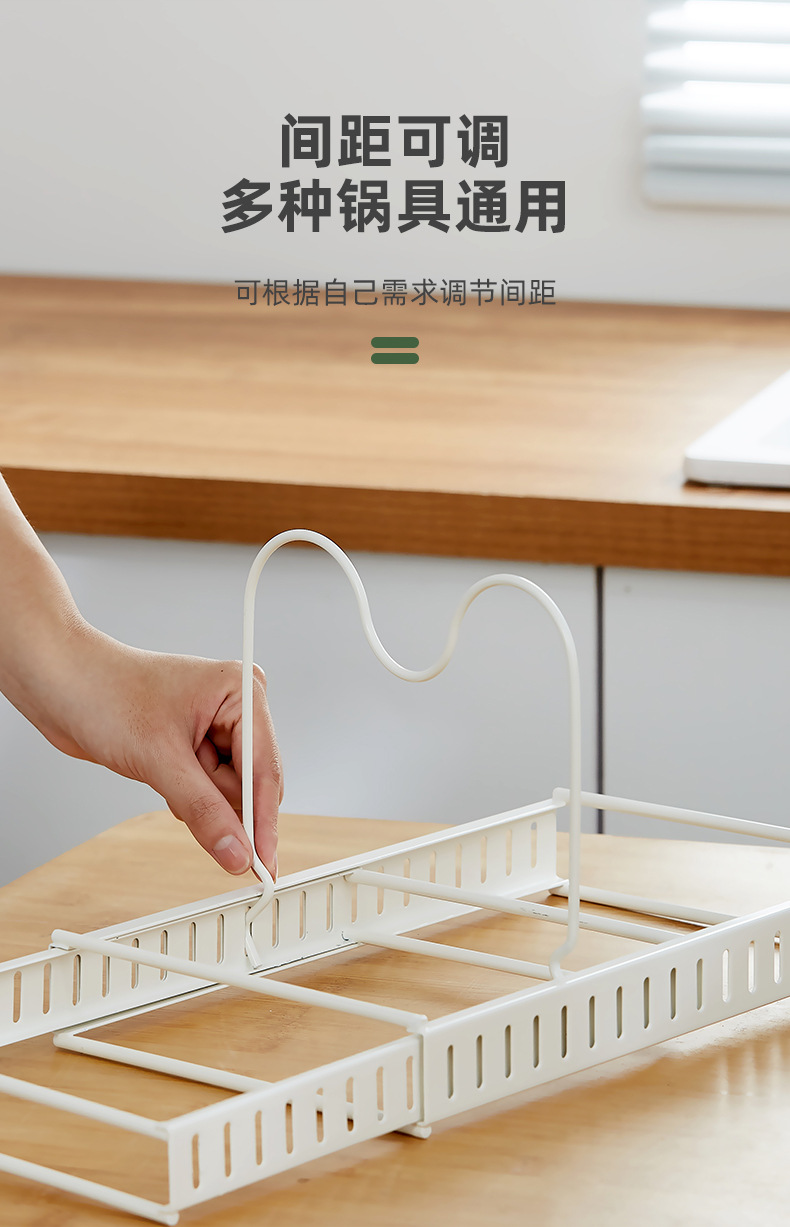 The adjustable kitchen storage rack can store multiple layers of kitchenware, cutting boards, cutting boards, pot LIDS, pot racks and other items. It is a telescopic storage rack pic 14