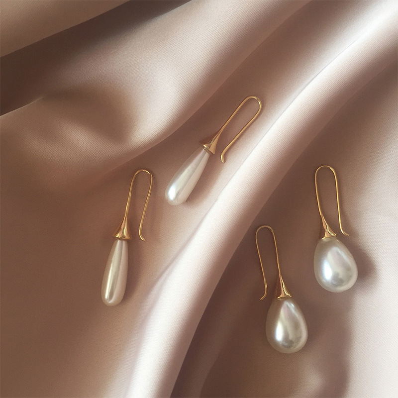 Niche design irregular metal zipper buckle earrings for women, fashionable, individual, simple and elegant, versatile stud earrings pic 1