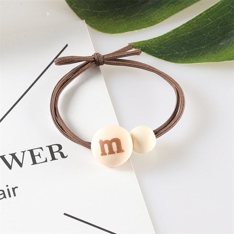 Korean version of the popular ins milk tea-colored M-bean hair band, high-elasticity hair tie rubber band, two-yuan store wholesale hair accessory supply pic 16