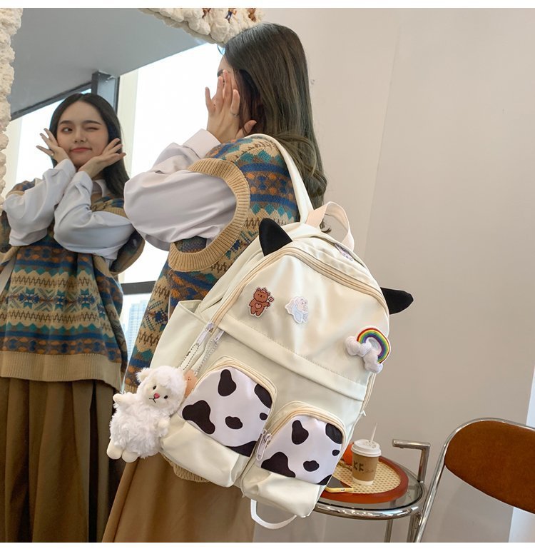 Japanese-style ins campus school style, fresh and cute, cute cow with earbuds, soft girl schoolbag, funny student backpack pic 6