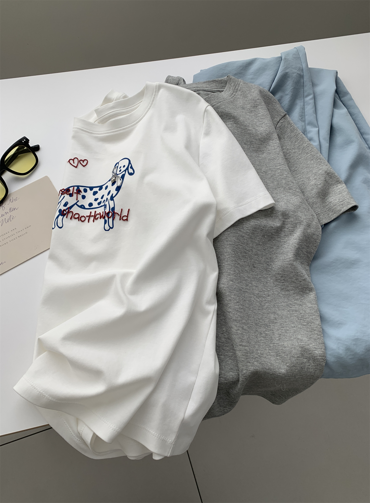 A trendy Korean-style loose and casual short-sleeved T-shirt with a bow and spotted dog print for women in summer, featuring pure cotton embroidery pic 10